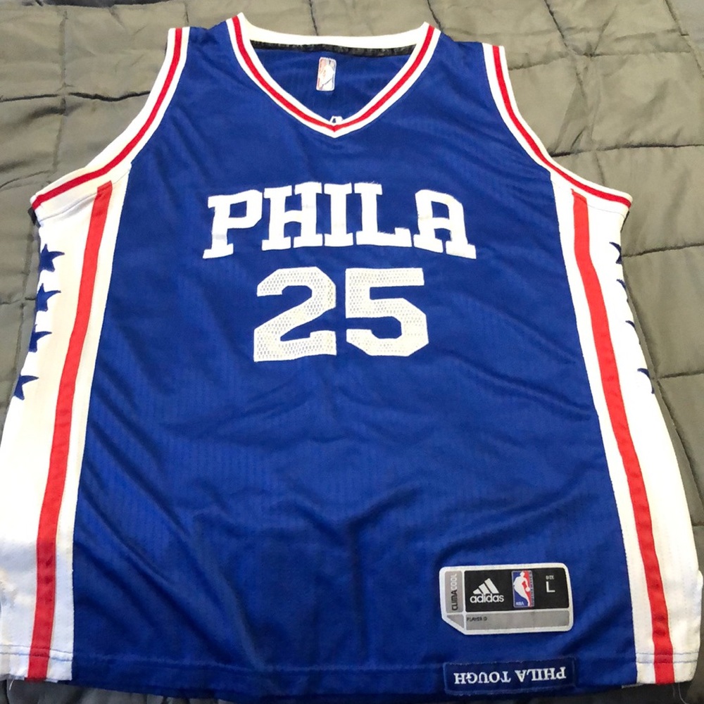 NBA jersey Phil’s jersey size large.
